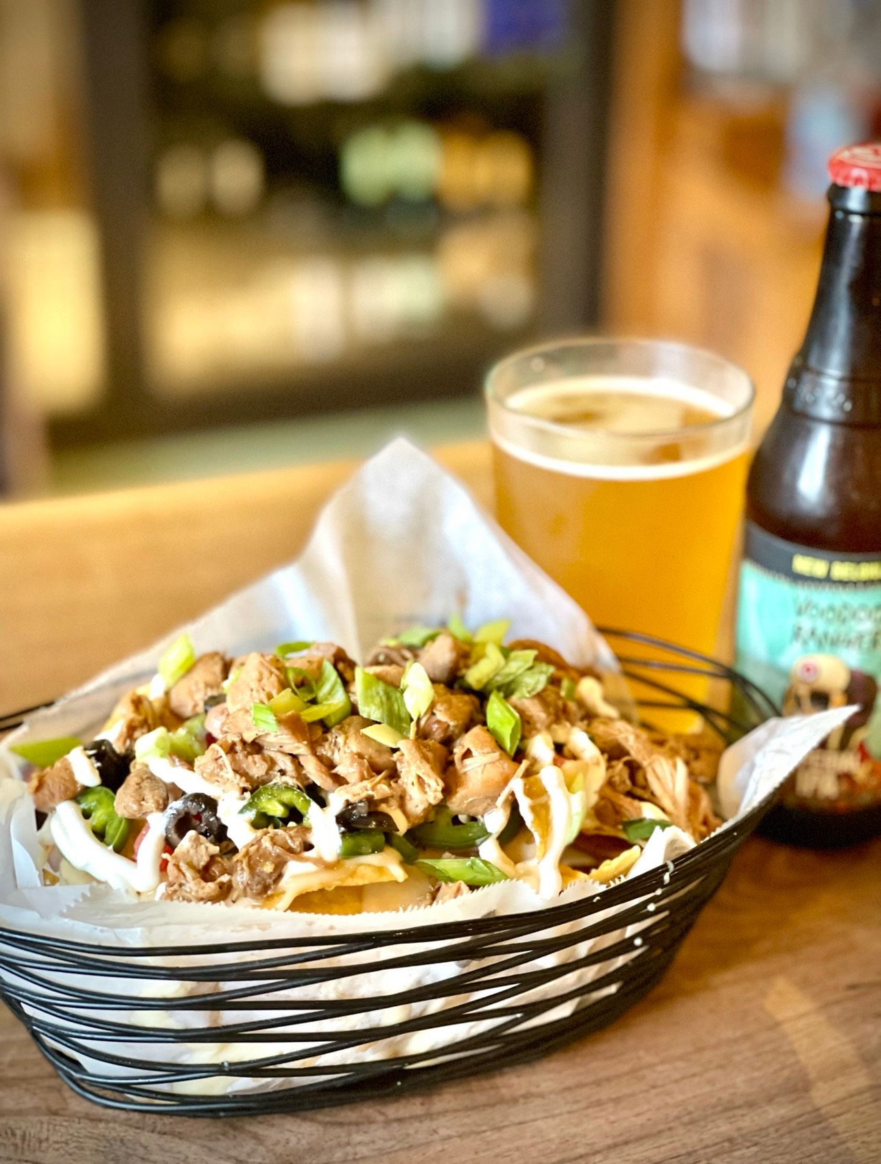 Basket of Filipino-fusion nachos and a beer at Barkadas, one of the new restaurants in West Virginia