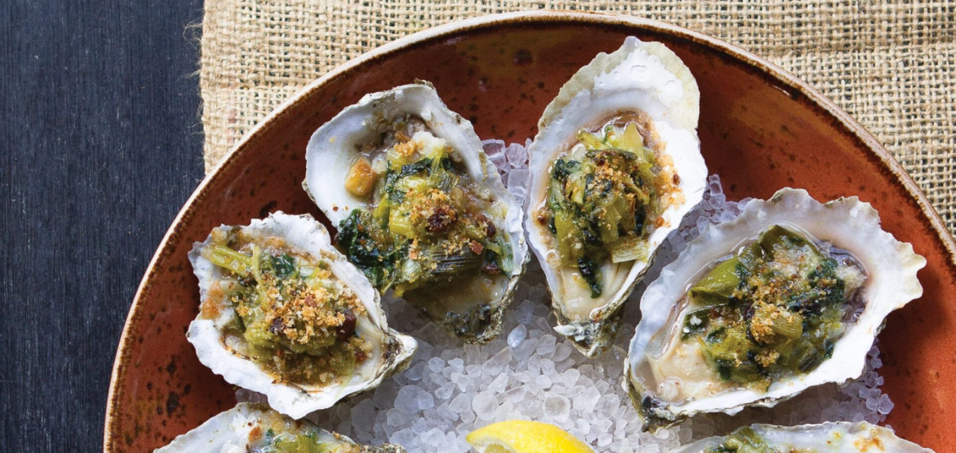 Welcome oyster season with baked Rappahannock oysters on the half shell over rock salt