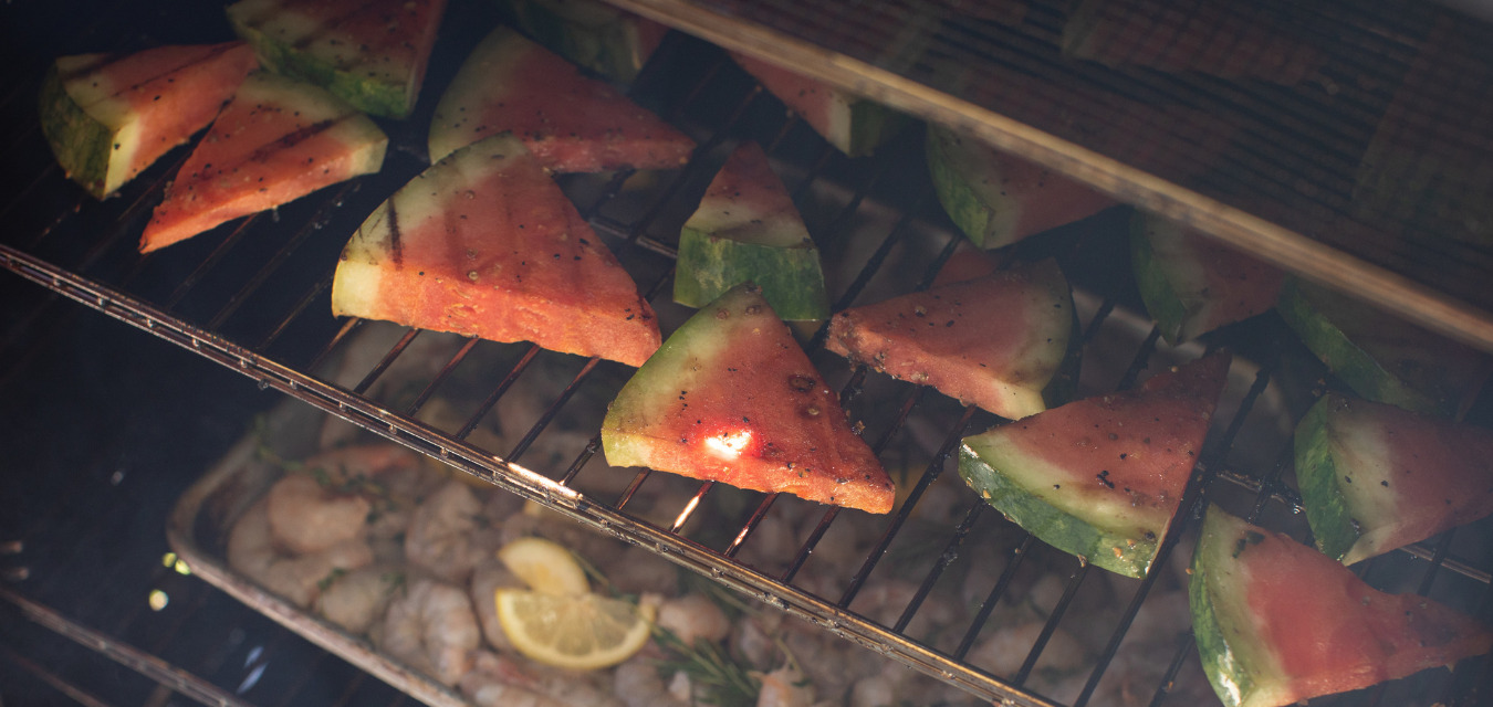 Watermelon steaks on a grill