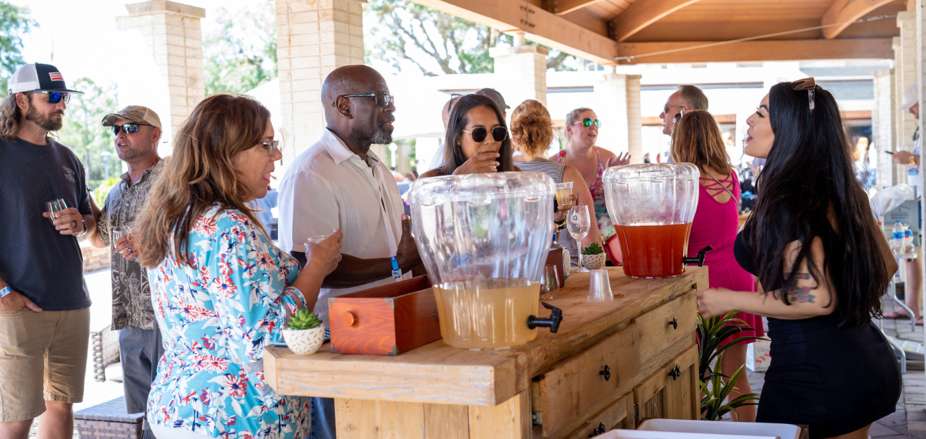 Guests ordering drinks at the St. Augustine Food + Wine Festival