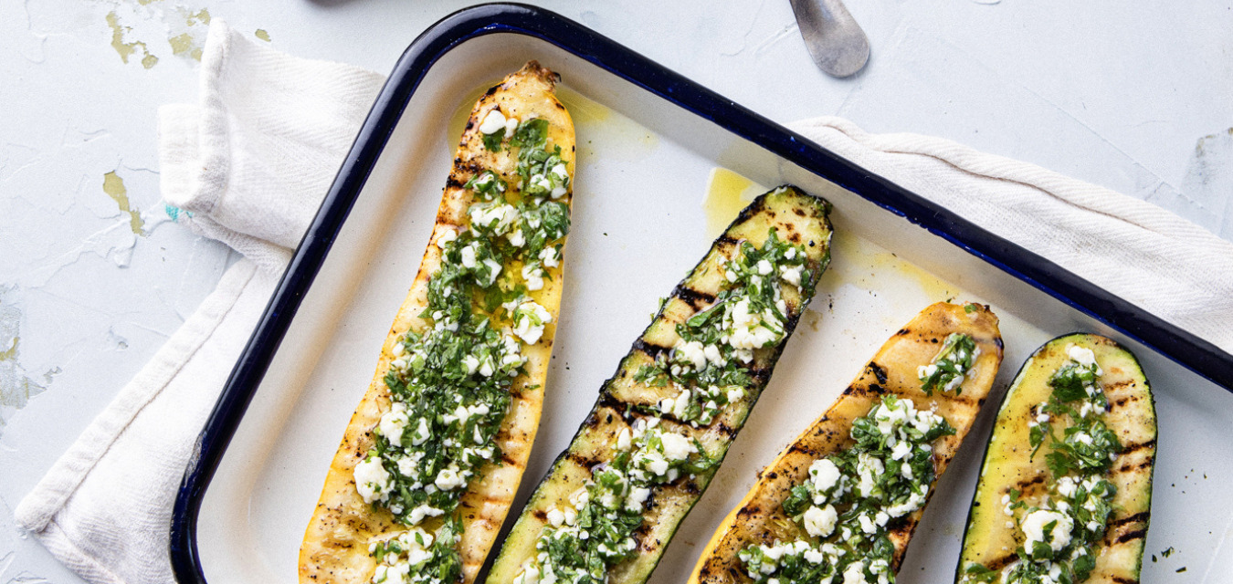 Grilled zucchini and yellow squash with cilantro and cotija on top