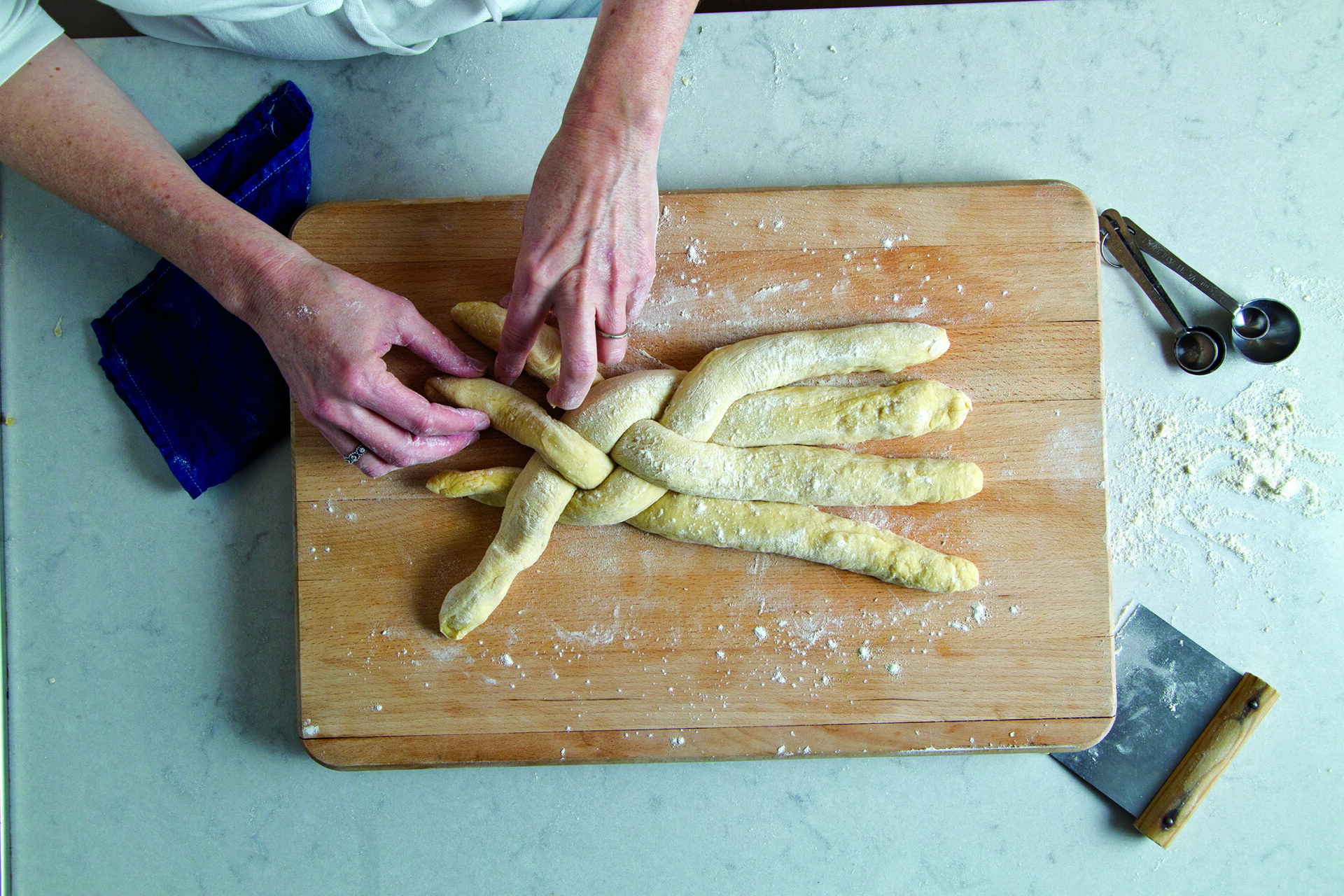 Challah Recipe Step 5: braiding the dough
