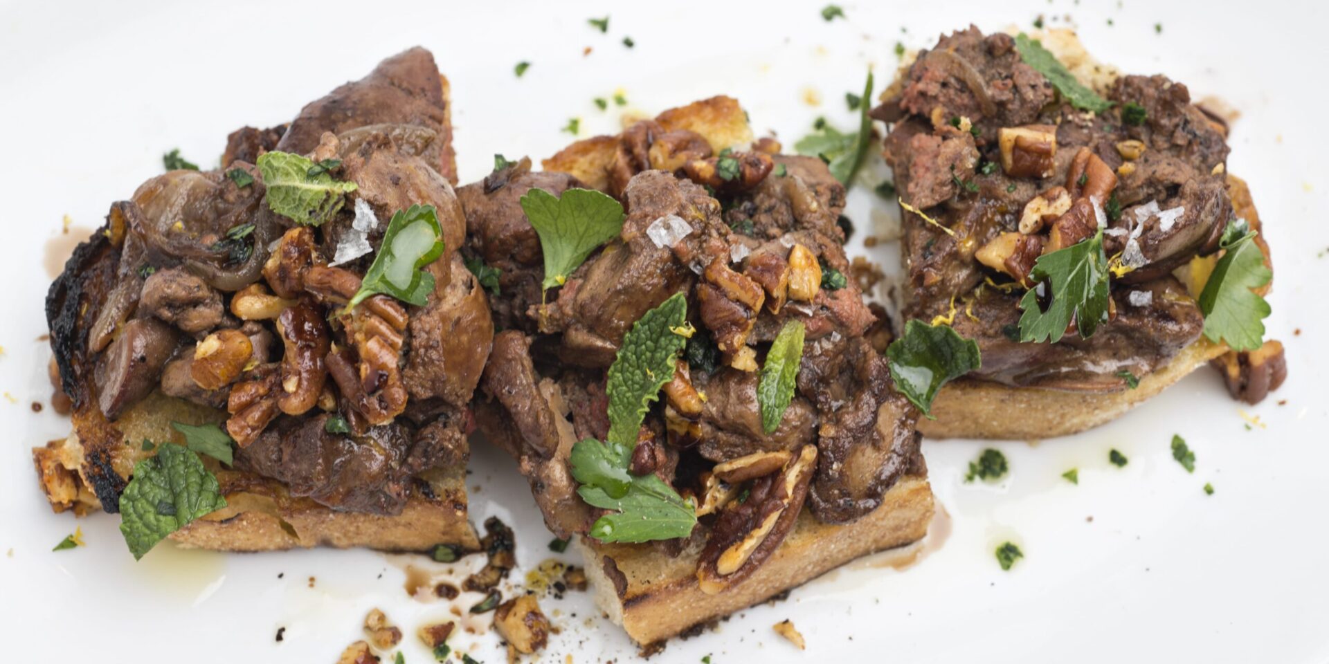 Cast Iron Chicken Liver Toast with Woodford Reserve Spiced Pecans and Mint scaled