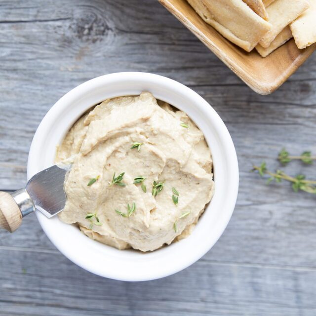 Charred onion dip in a bowl