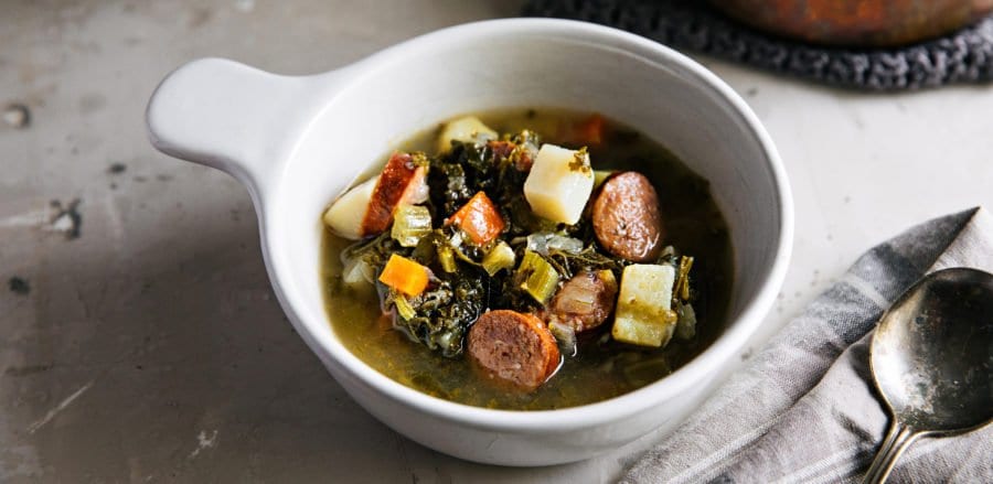 A bowl of potato, sausage, and kale soup is one of TLP's top fall soup recipes