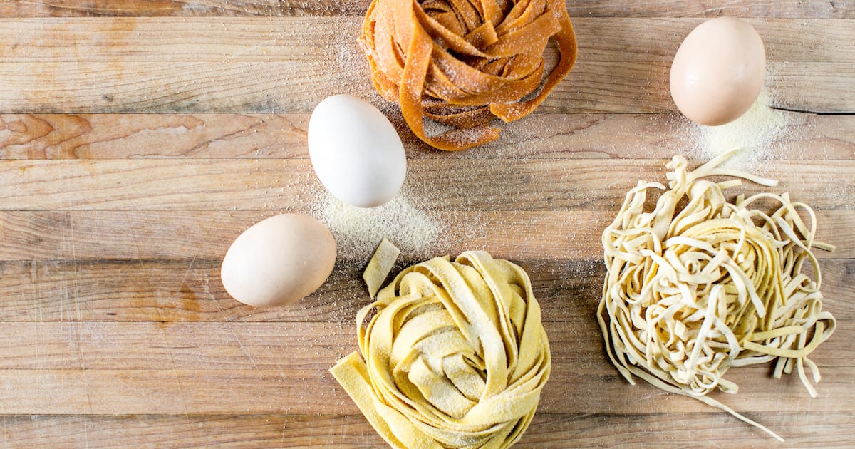 Homemade pasta nests with fresh eggs