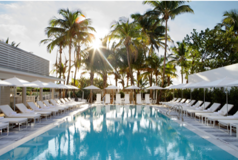 The reflection pool lined by lounge chairs in Miami