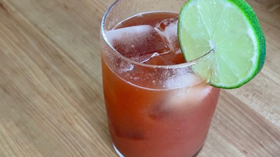 The Spring Cocktail: a ruby red colored Michelada with a fresh sliced lime. 