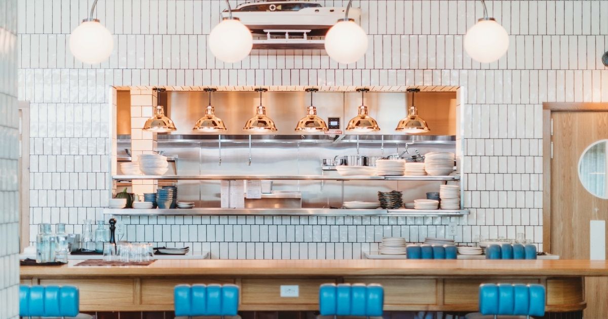the blue barstools at the chefs counter at Seabird in Wilmington