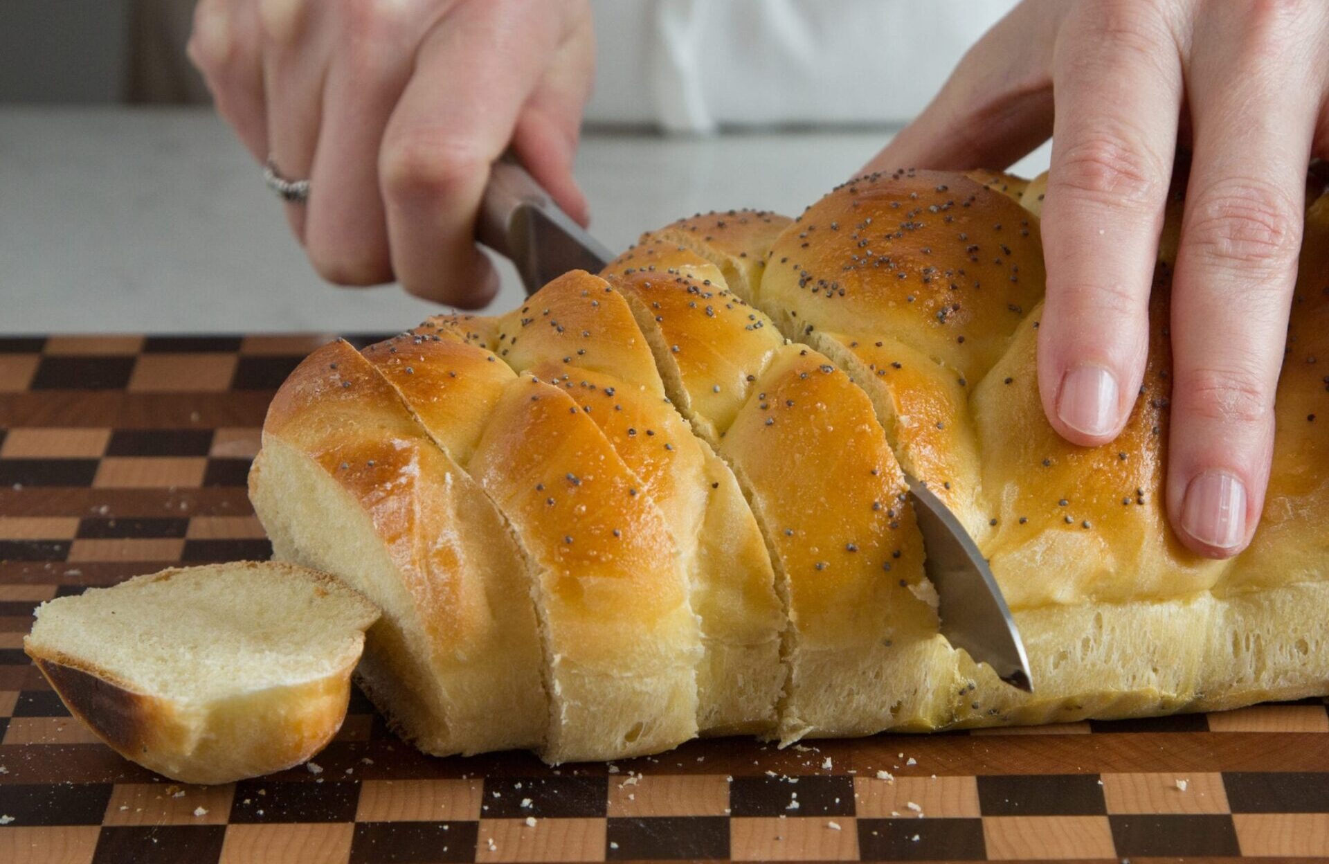 Slicing challah bread