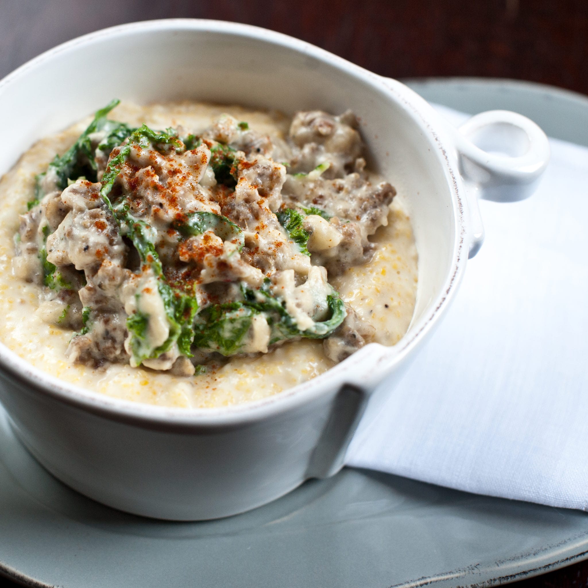 Country-Sausage-and-Mustard-Greens-Gravy-with-Grits
