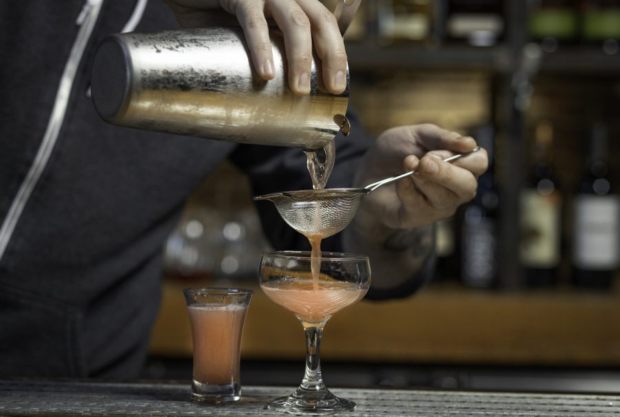 One of the things to do in Birmingham: photograph of a cocktail being poured in a bar