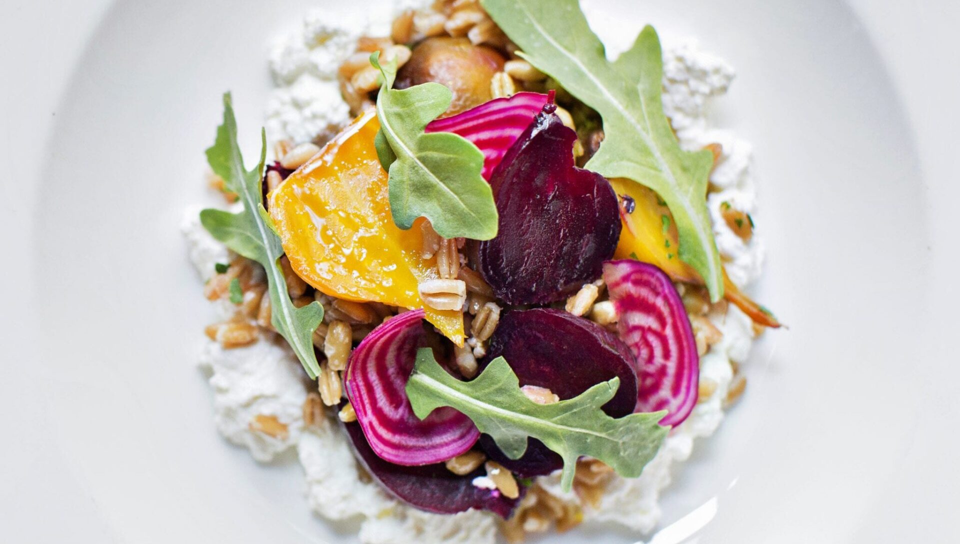 Roasted-Baby-Beets-and-Farro-on-Honeyed-Ricotta-with-Walnuts-e1709038211704.jpg