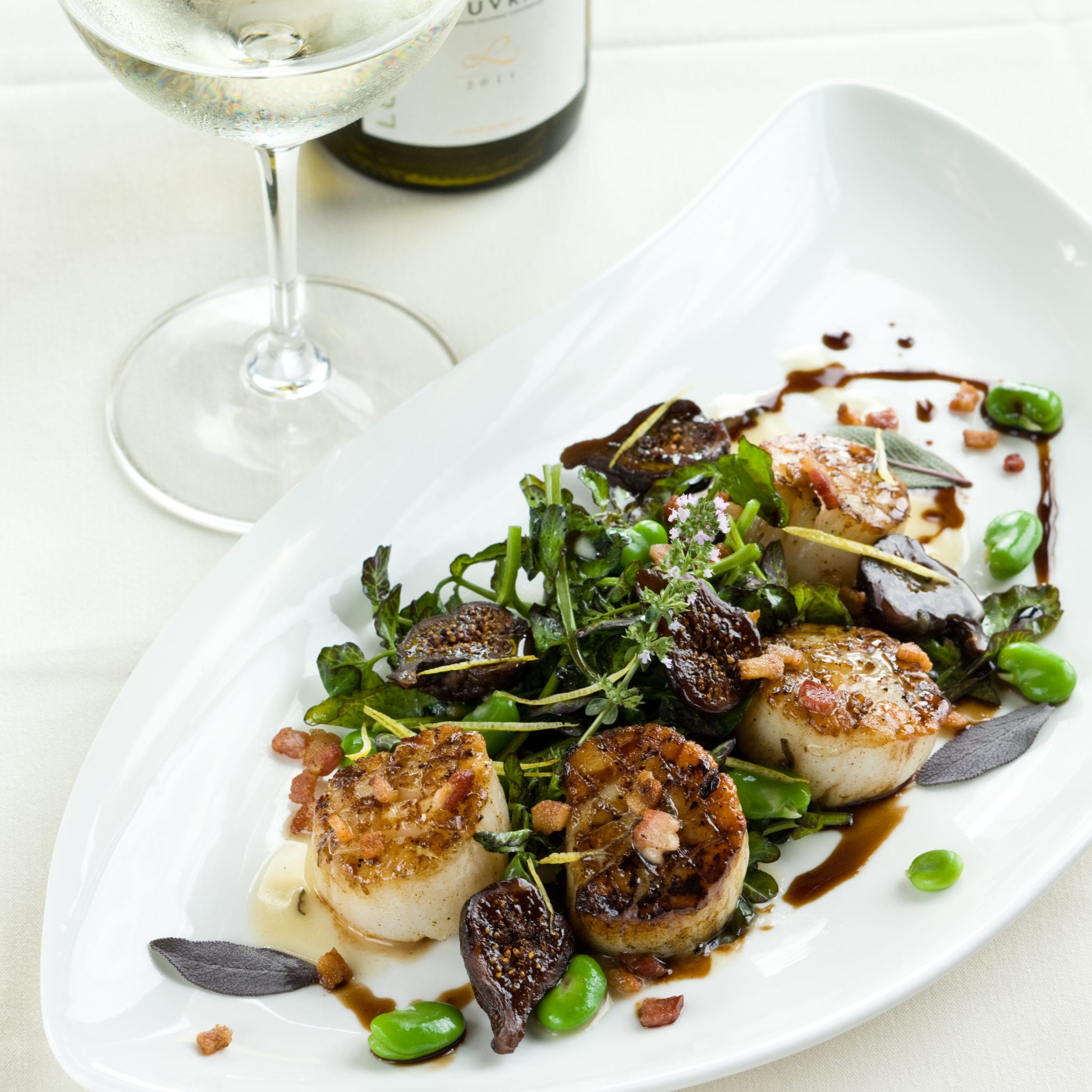 Seared-Diver-Scallops-with-Caramelized-Fig-Bentons-Bacon-Fava-Beans-and-Sage-Brown-Butter.jpg