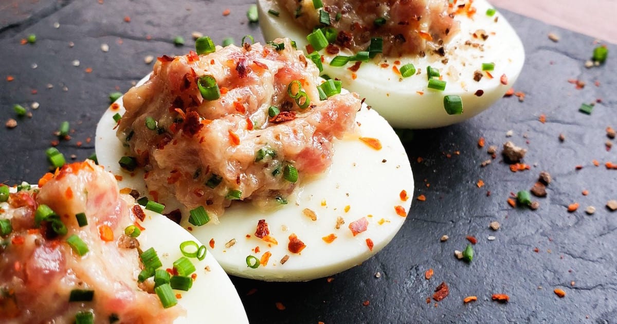 3 Deviled eggs topped with Bentonville Ham