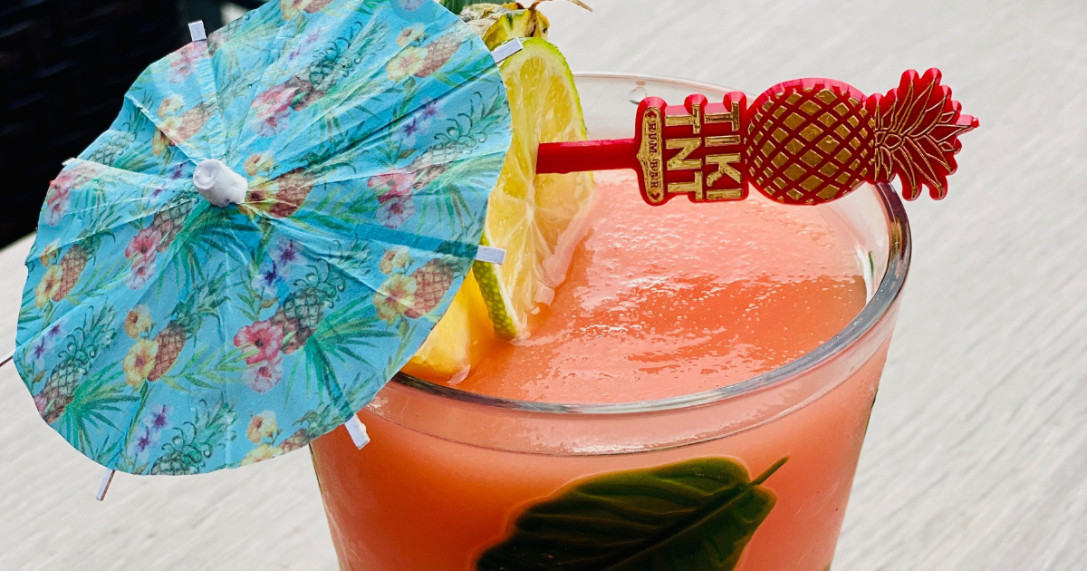 The Baby Bird made at Tiki TNT gets its fun pink color from Aperol and pineapple juice