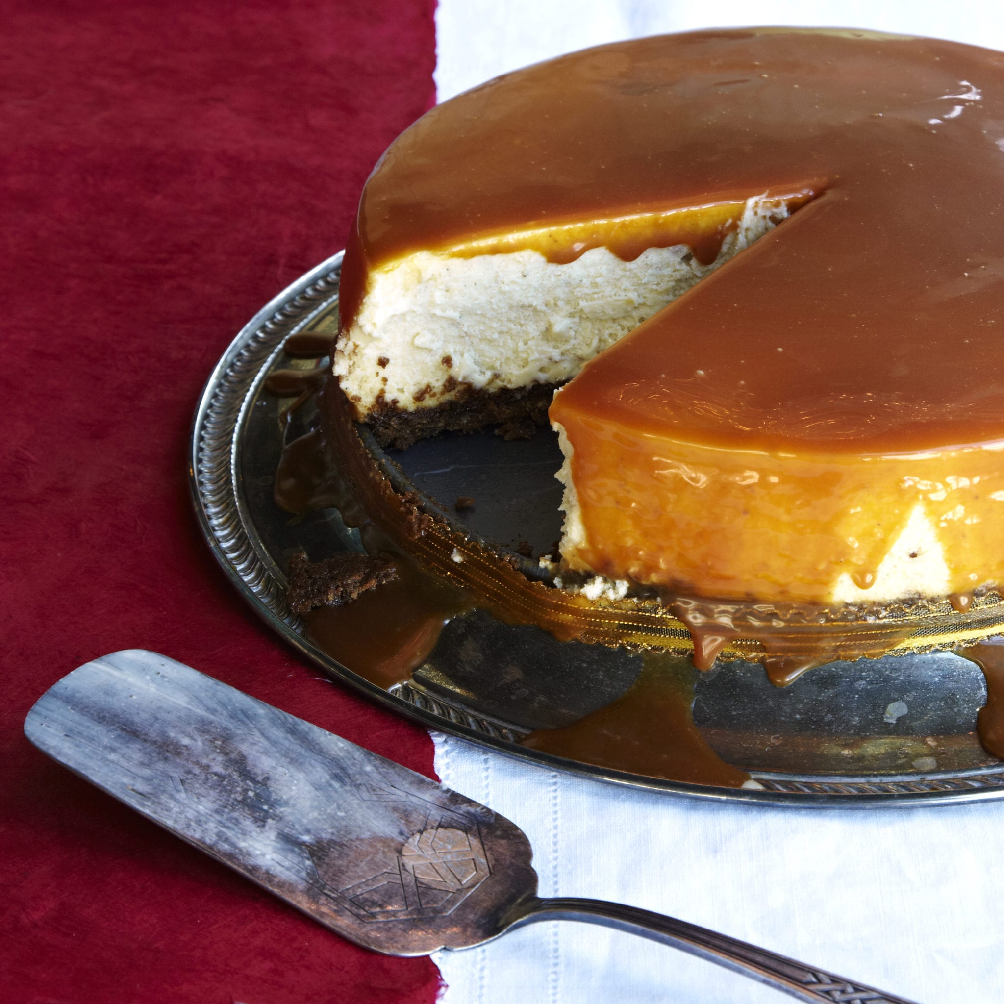 Bring the eggnog cheer with this eggnog cheesecake recipe drizzled with caramel sauce from Savannah's Back in the Day Bakery.
