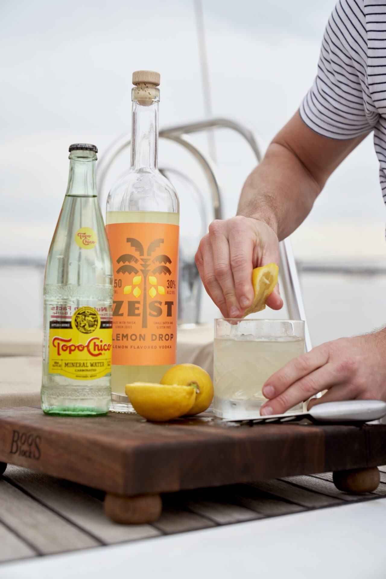Creating a cocktail with Zest and Topo Chico