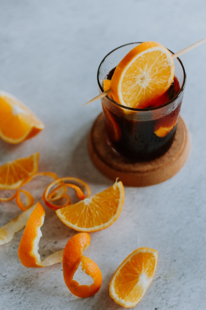 Vermouth with orange garnish as a fortified wine cocktail