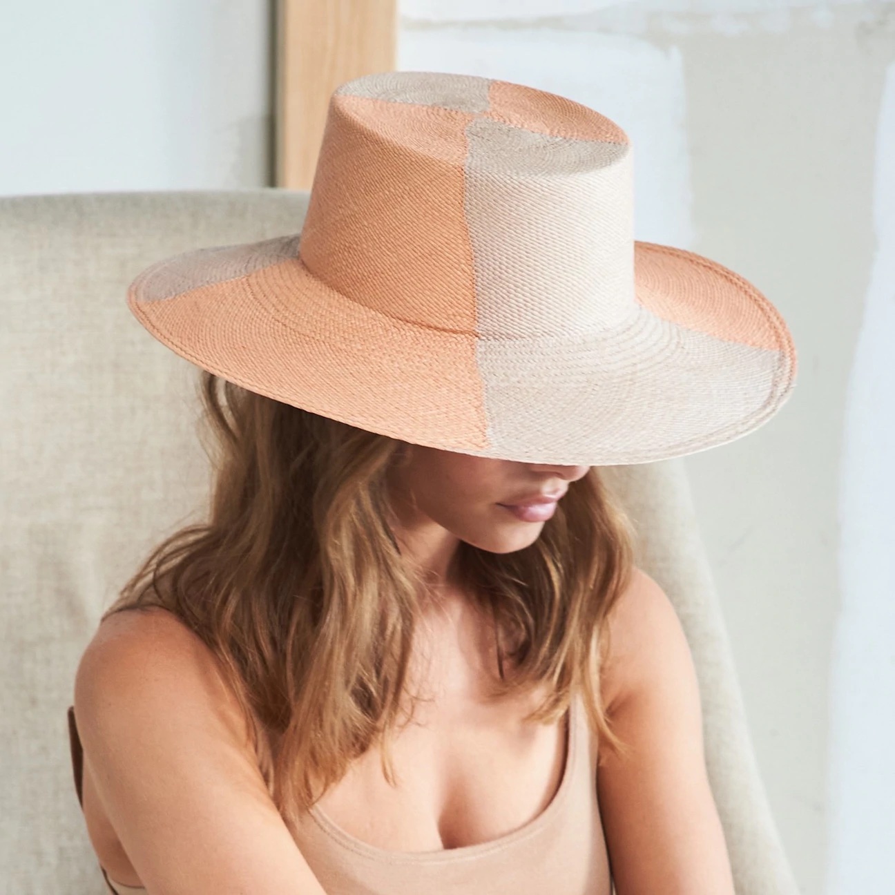 Handwoven straw sun hat keeps your face and neck safe while waiting in lines at food festivals.