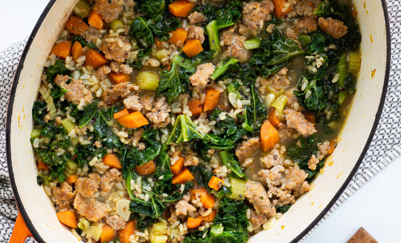 Grain stew with sausage and hearty greens
