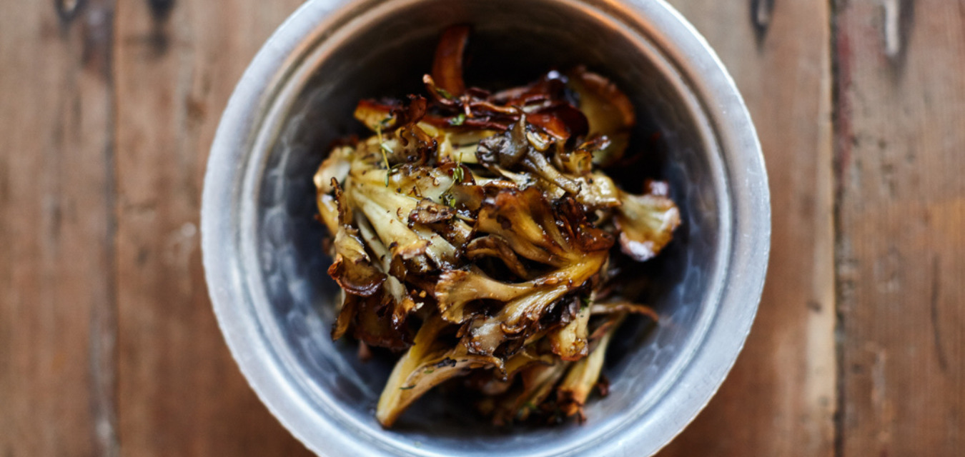 Bowl of roasted hen of the woods mushrooms