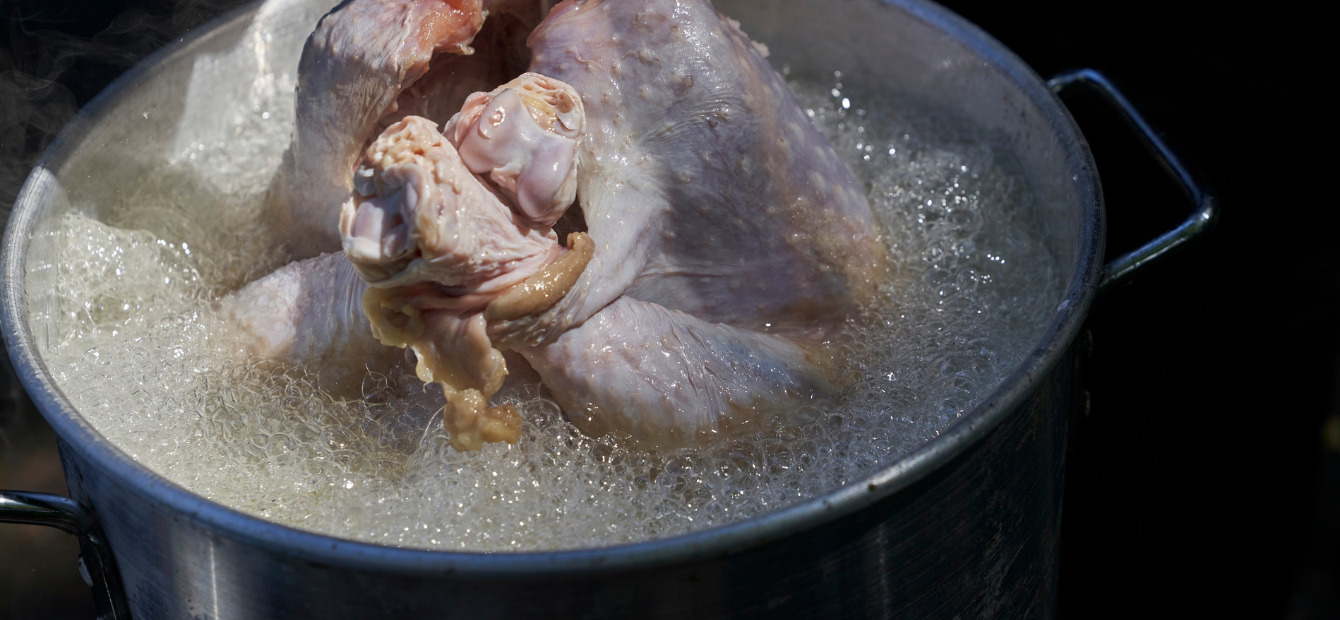 Dunking a turkey in the fryer, one of our most popular november recipes