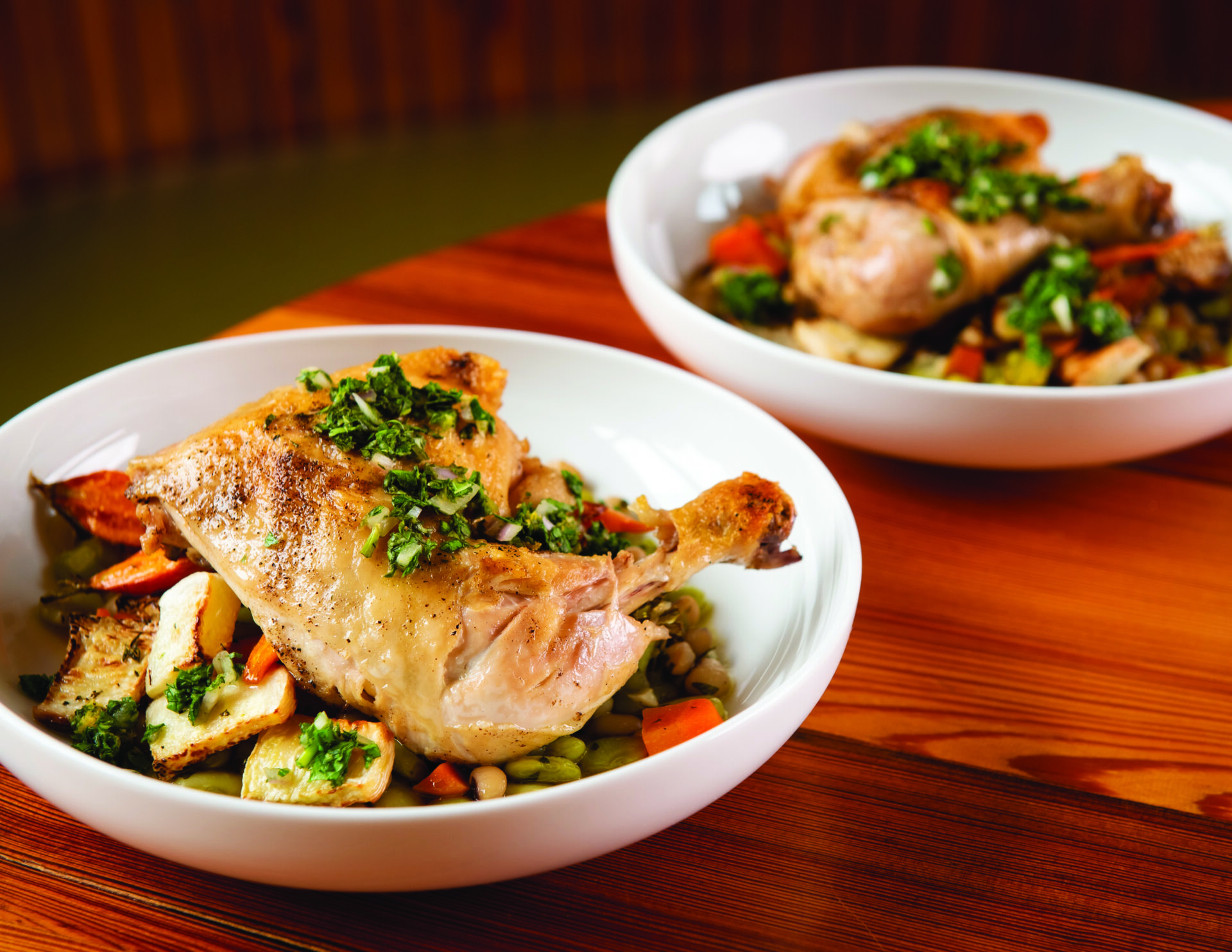 The chicken cassoulet in shallow bowls