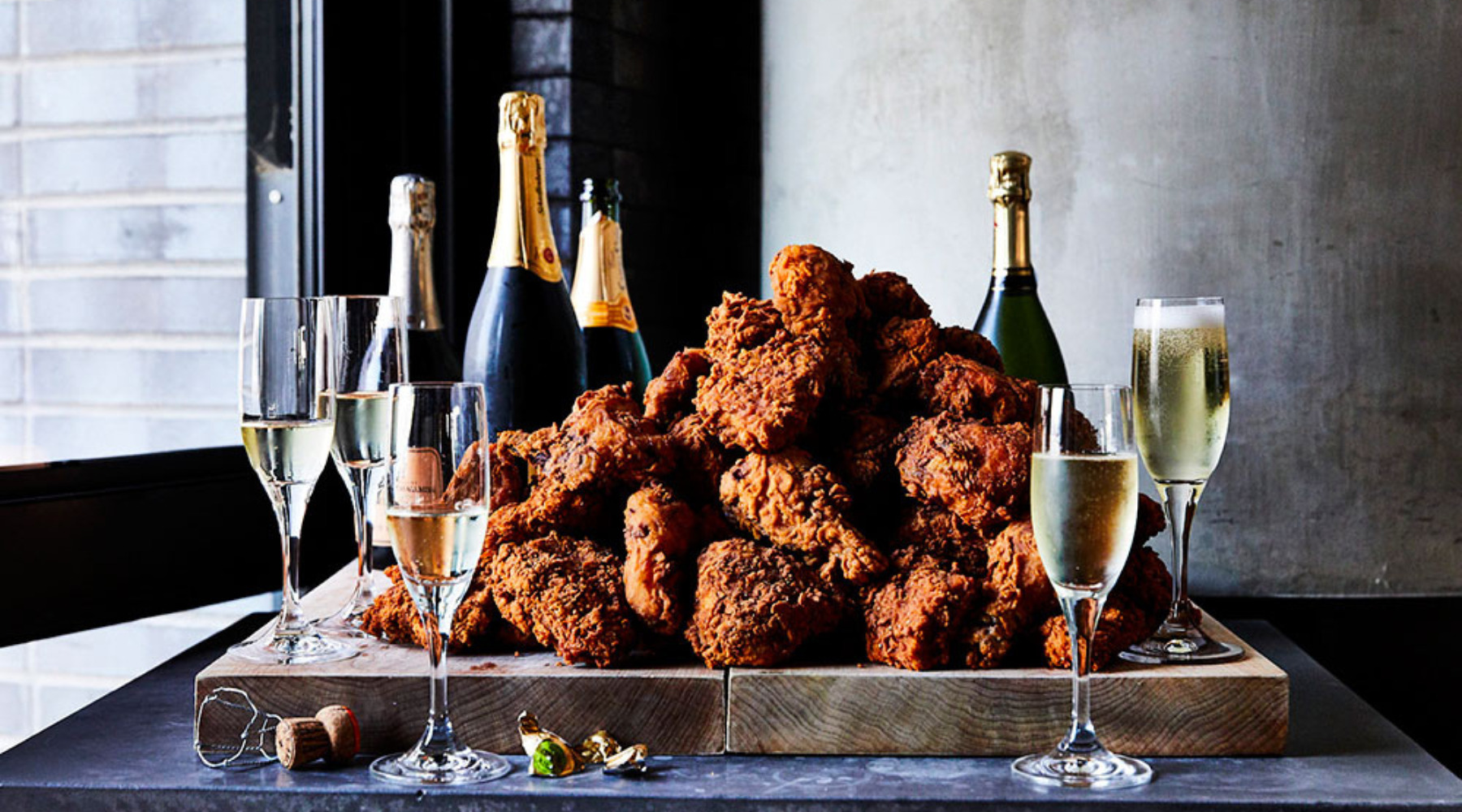 Fried chicken and bottles of Champagne from the Birds, Bubbles & Blues event at the Austin Hotel restaurant Geraldine's