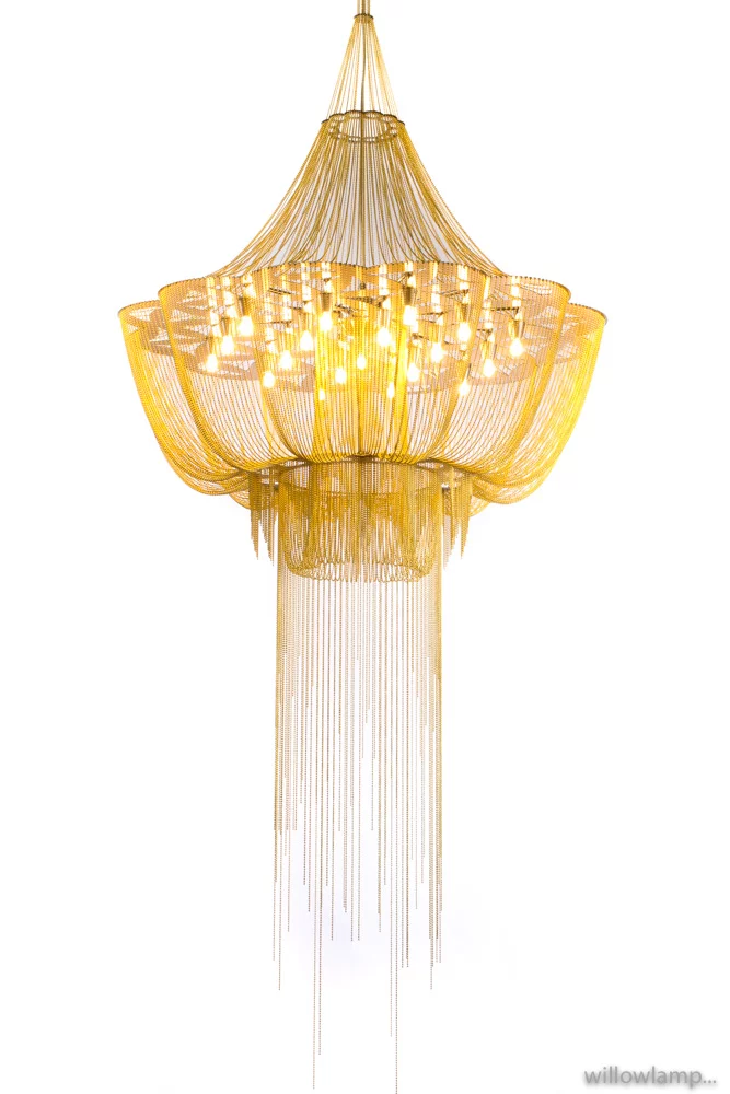 Gold chandelier from Kristen Kish's Austin Arlo Gray