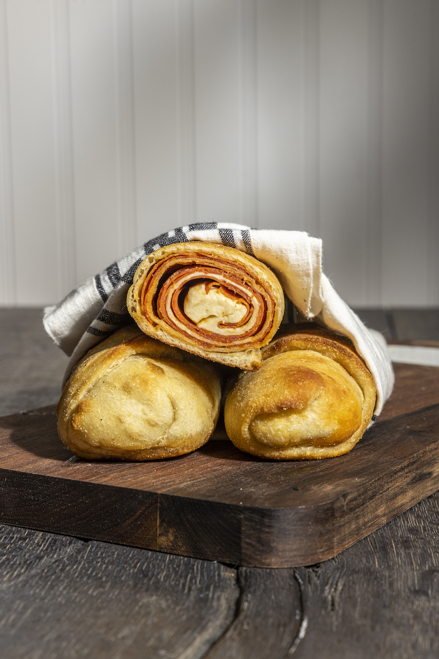 Pepperoni rolls wrapped in a towel to keep warm