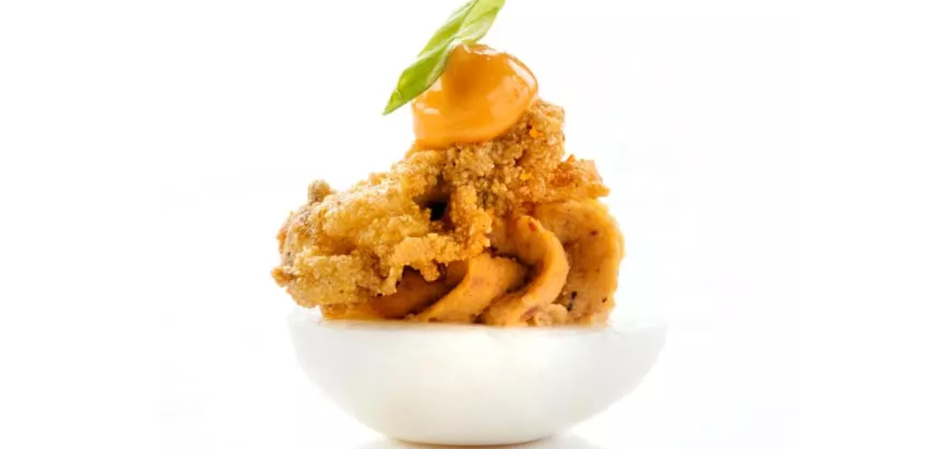 Tasso Deviled Eggs with Fried Oyster and Sriracha Aioli