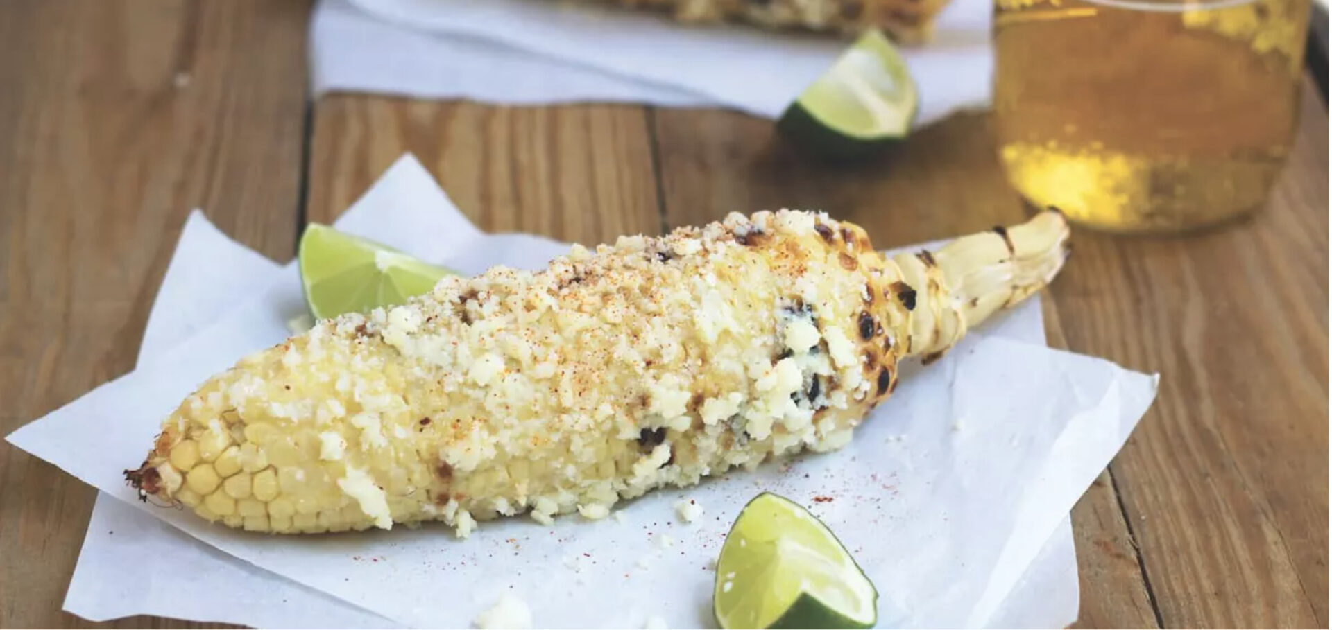 Elote: Mexican street corn with mayo lime and cheese, one of six vegetarian dishes in this post