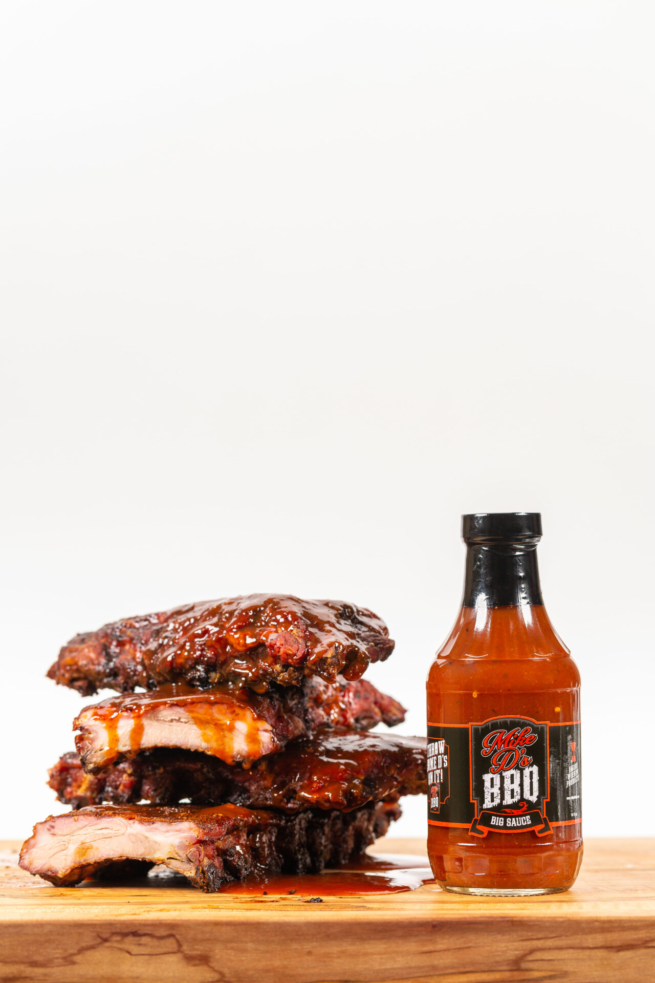 Big Mike's Signature sauces ribs and a bottle of his sauce for the Juneteenth picnic