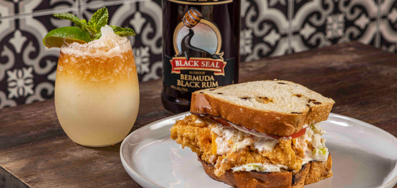 Goslings Bermuda Fish Sandwich with a frozen dark 'n stormy and a bottle of Goslings rum