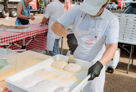 Woman making Poppy Pies at MS Book Festival