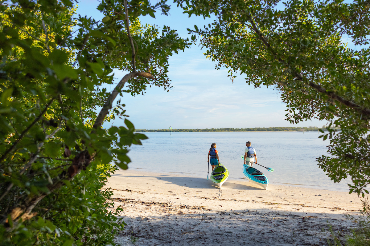 Two people Kayaking in the Calusa Blueway