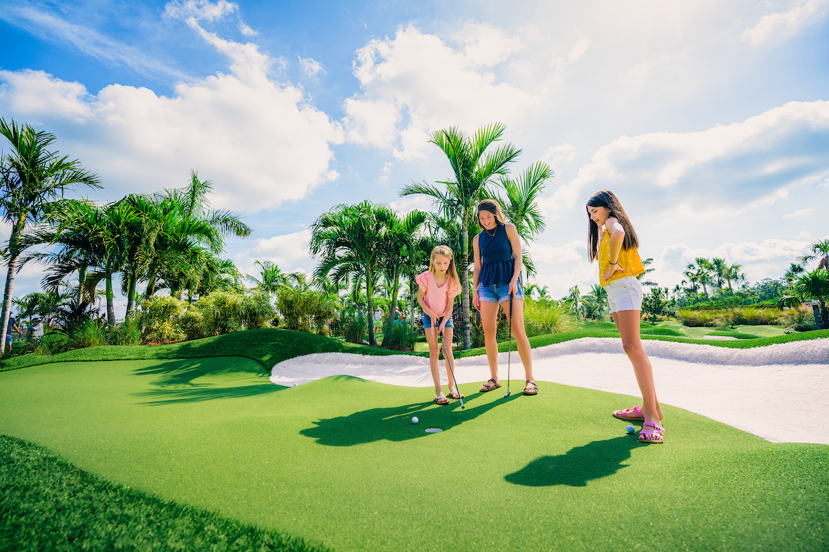 Family on a golf course in Fort Myers