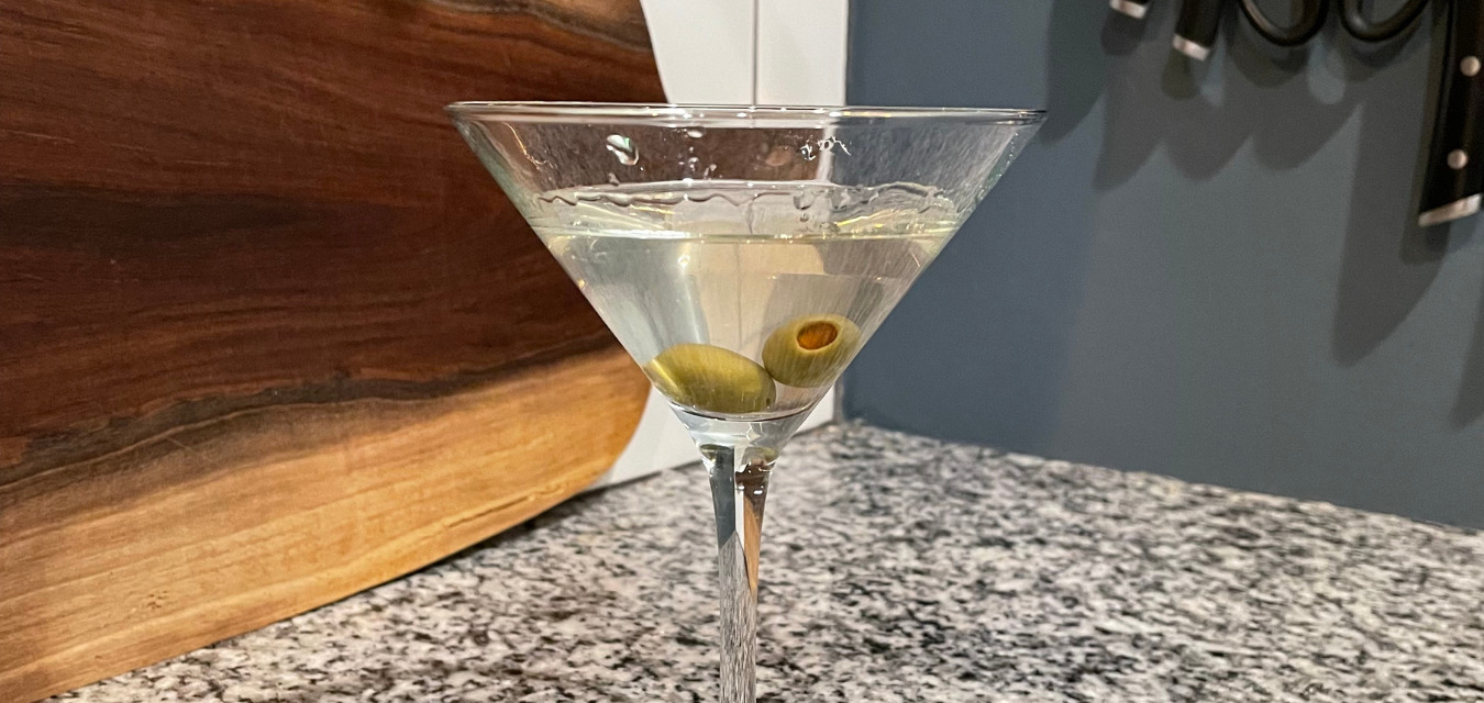 Classic Cure martini with two olives