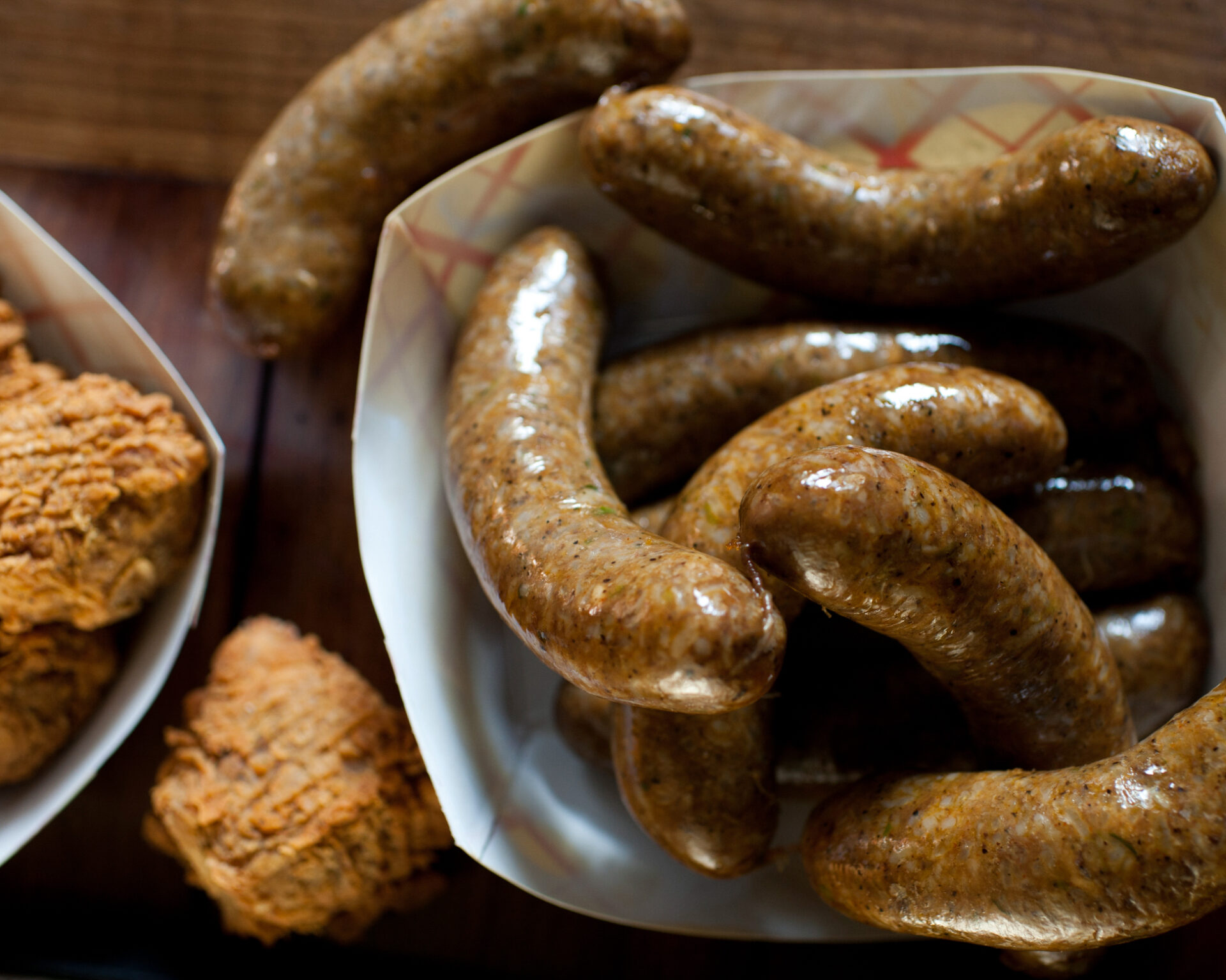 a basket full of brown Cajun sausages called boudin Lafayette, Louisiana