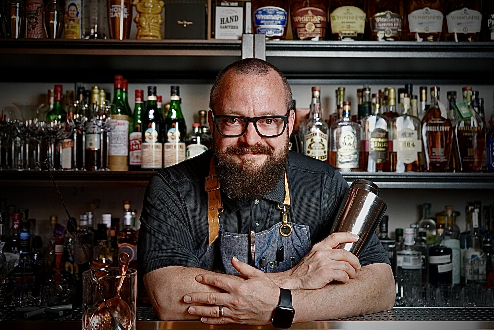 Bob Peters posing in his new cocktail bar set to open in March 2024