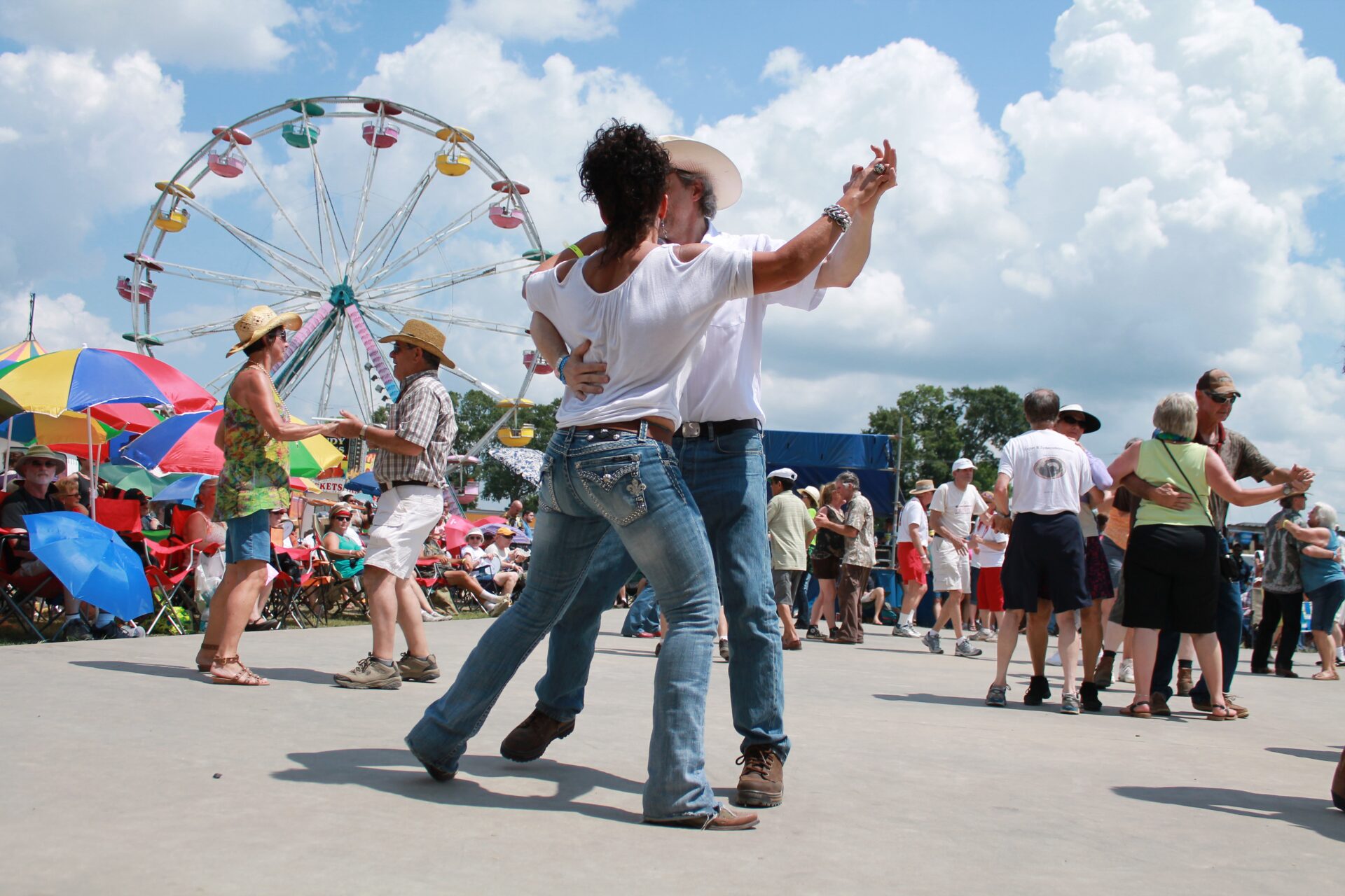 Couple dancing to Zydeco at the Breaux Bridge Crawfish Festival in Louisiana.