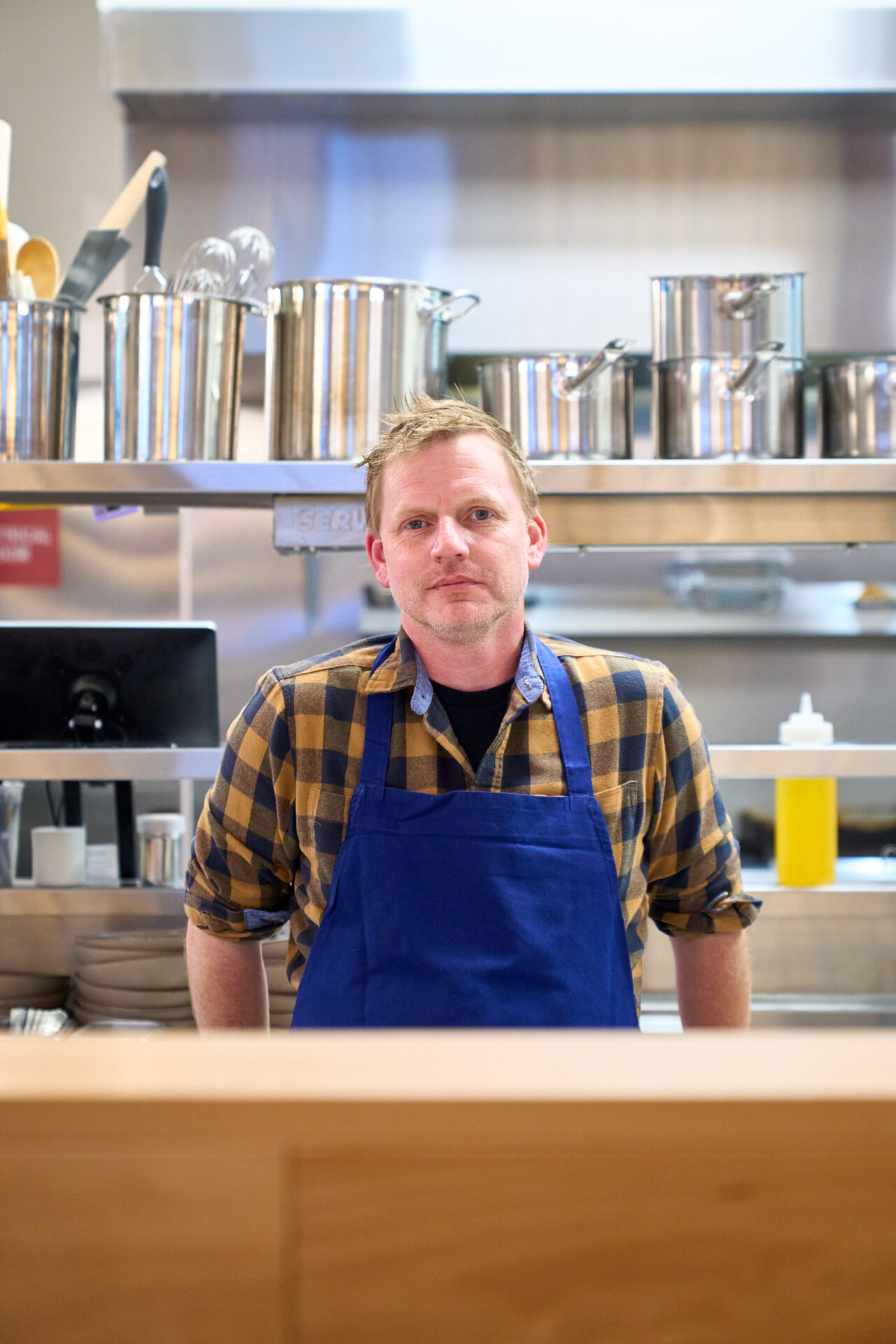 Chef Jeff Farmer of Stock Café poses in the photo