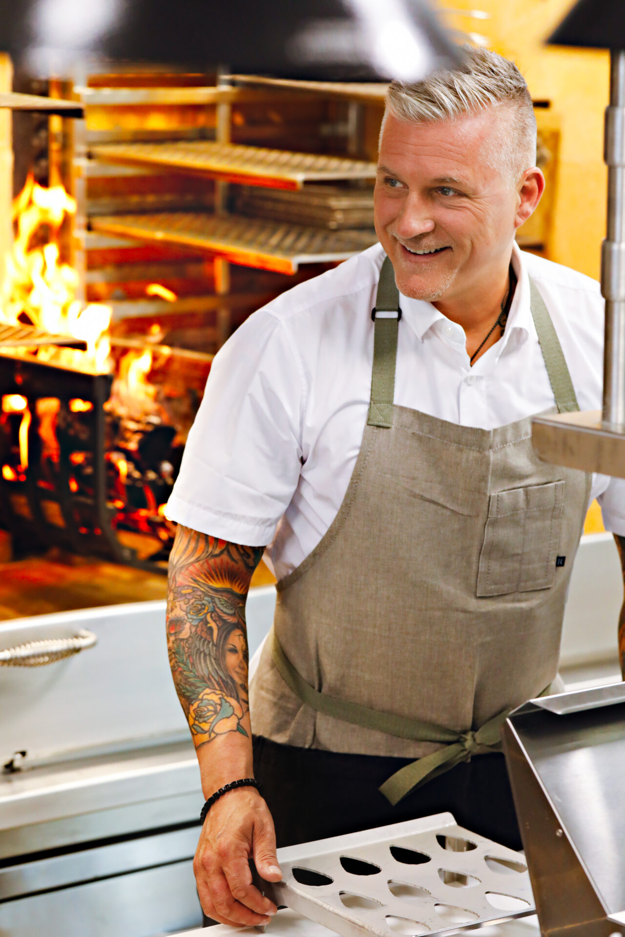 Headshot of Scott Crawford cooking at his latest restaurant, Brodeto 
