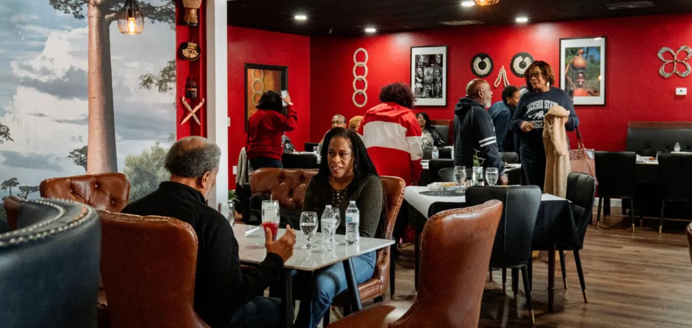 Customers dining at Sambou's African Kitchen