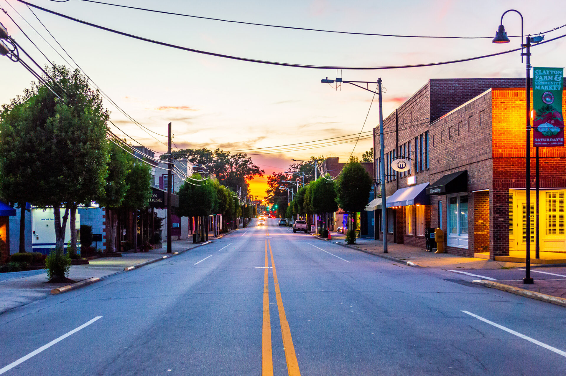 A street at sunset in downtown Clayton 