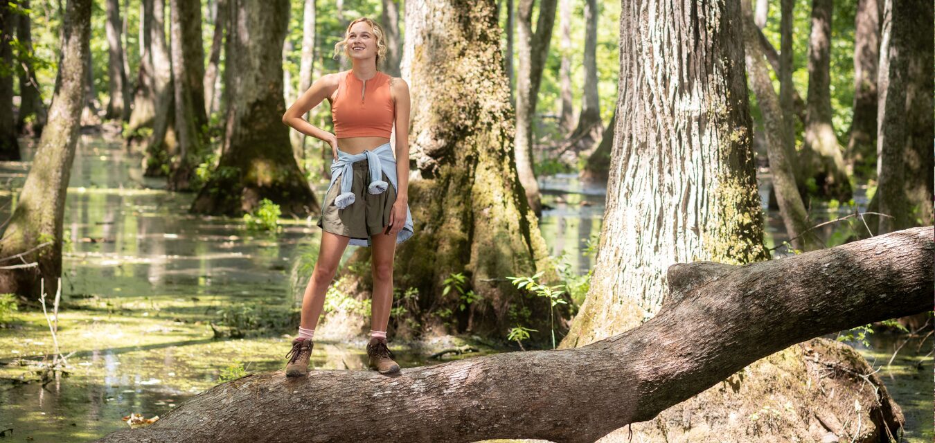 Woman hiking outdoors in Mississippi.