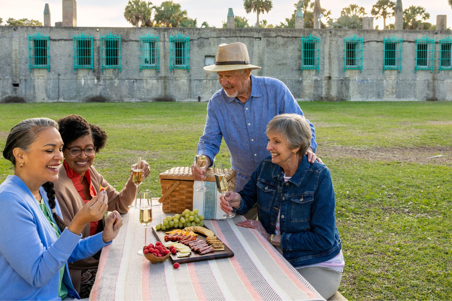 Group of people eating outside of the Atalaya Castle in Myrtle Beach, South Carolina