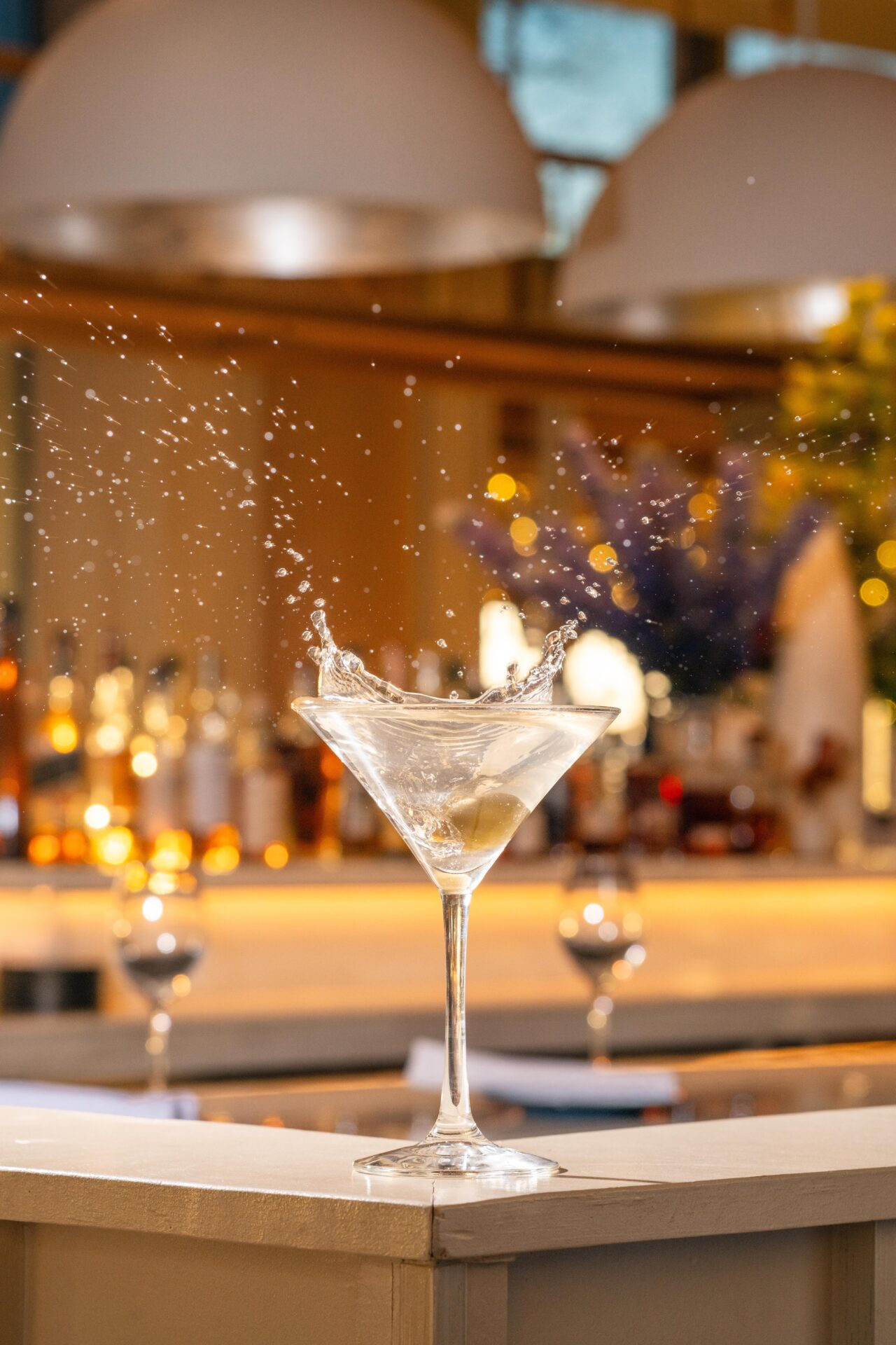 An olive makes a splash in a martini at The Finch, a hot new restaurant in Nashville