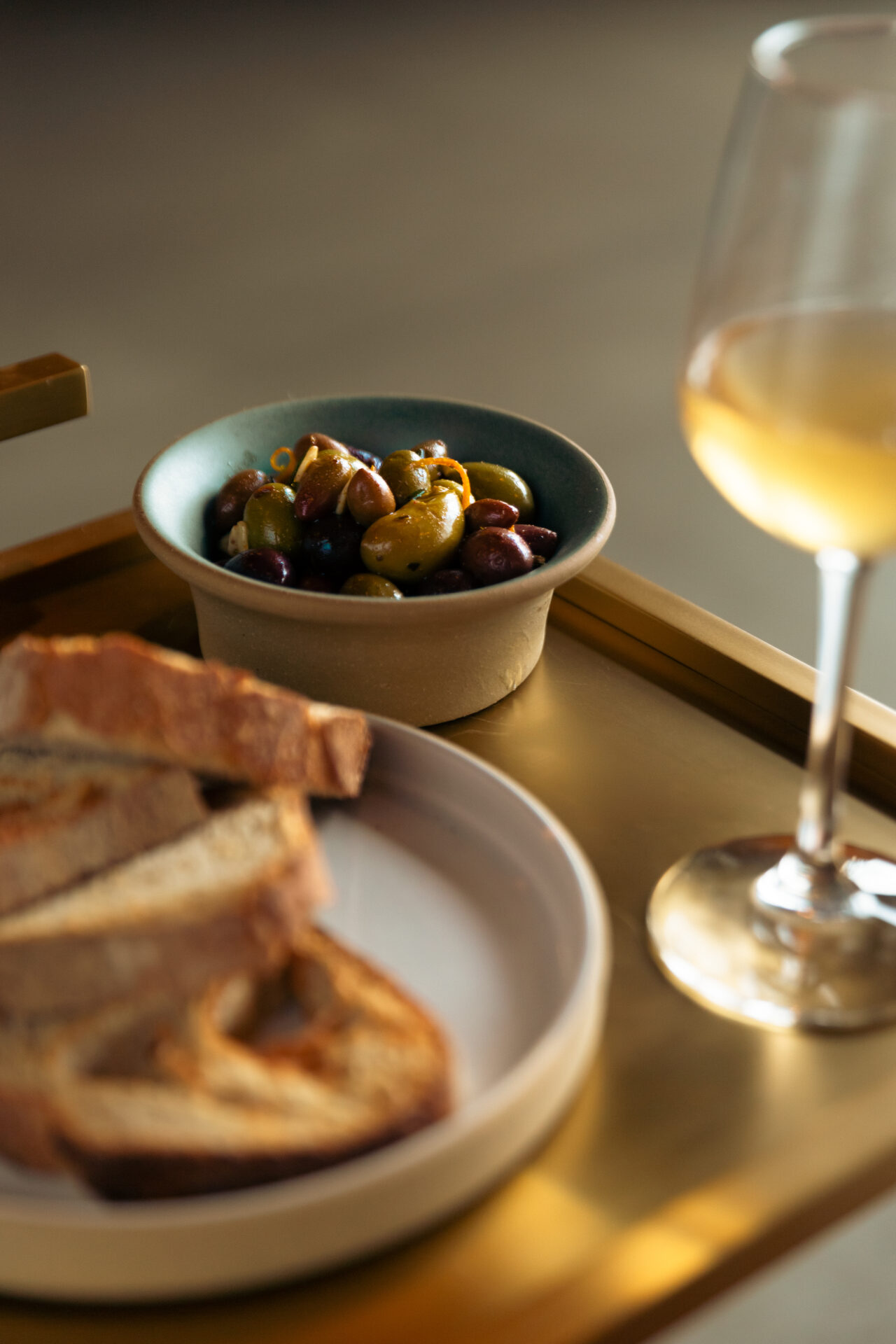 Olives, bread and wine at the Sun Room, a hot new restaurant in Nashville 